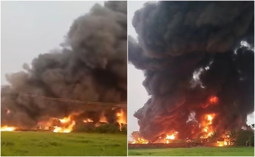 Cột khói đen kịt bốc cao hàng chục mét. (Ảnh: Người lao động)