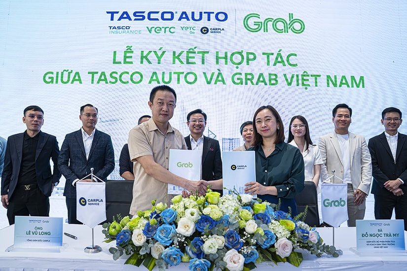 Lễ ký kết thỏa thuận hợp tác toàn diện giữa Tasco Auto và Grab Việt Nam thúc đẩy di chuyển xanh