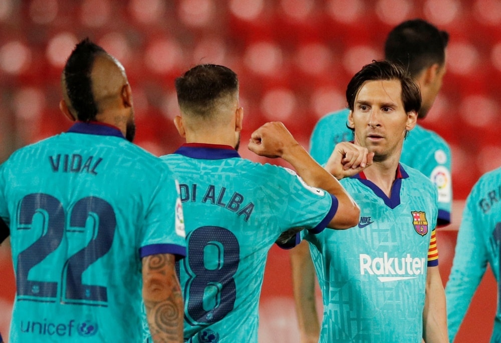 Arturo Vidal và Lionel Messi trong màu áo Barcelona giai đoạn 2018-2020
