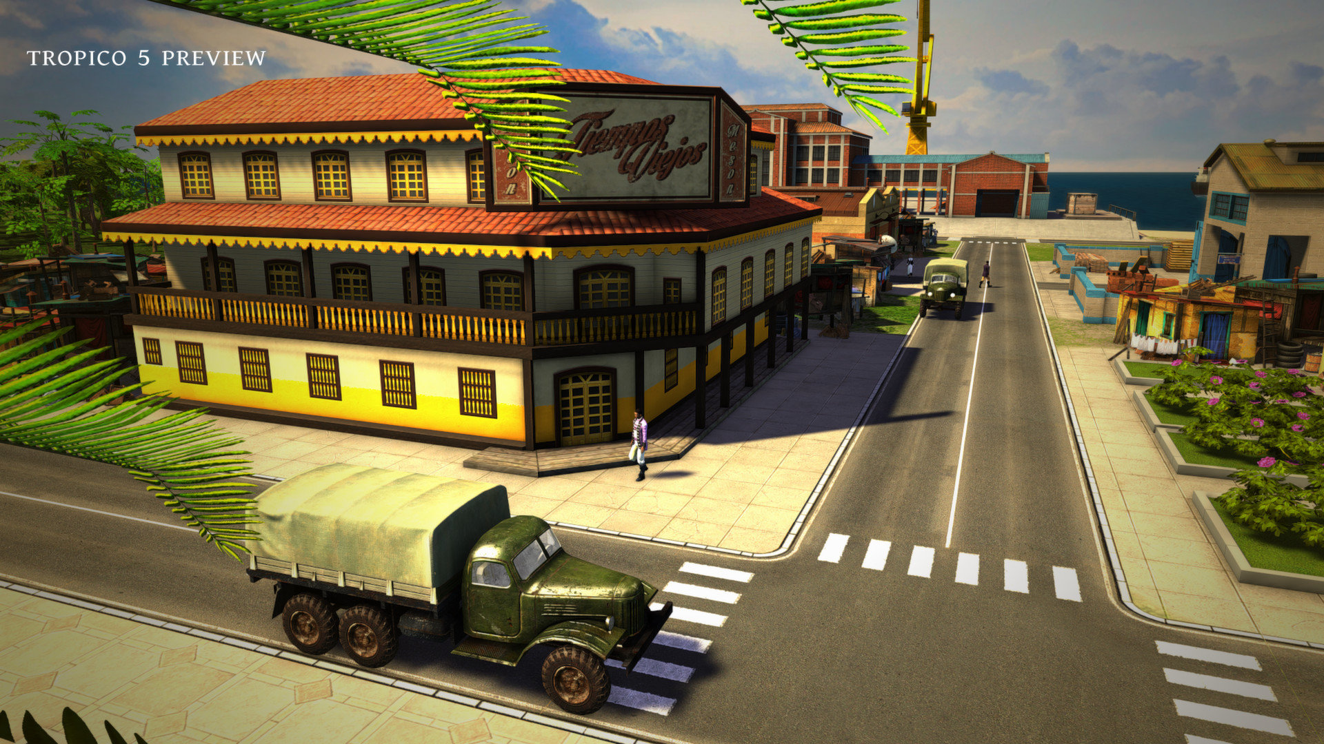 Hình ảnh một tòa nhà và phương tiện di chuyển trong game Tropico 5.